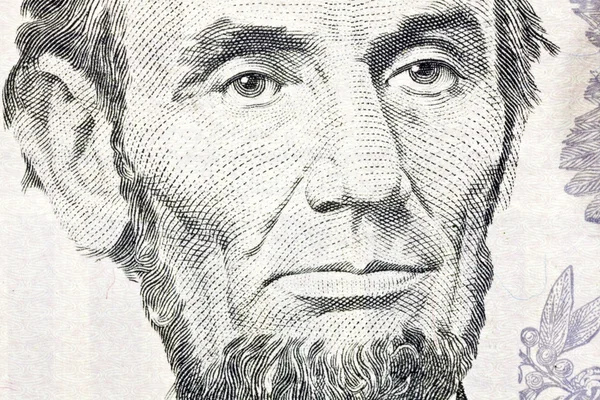 Becsületes, Abe Lincoln makró közelről minket öt dollárost — Stock Fotó