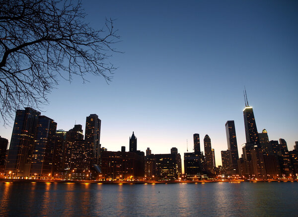Chicago towers, Lake Michigan with a soft night sky.