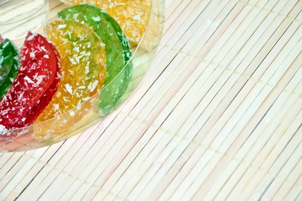 Multicolored marmalade on a beige background — Stock Photo, Image