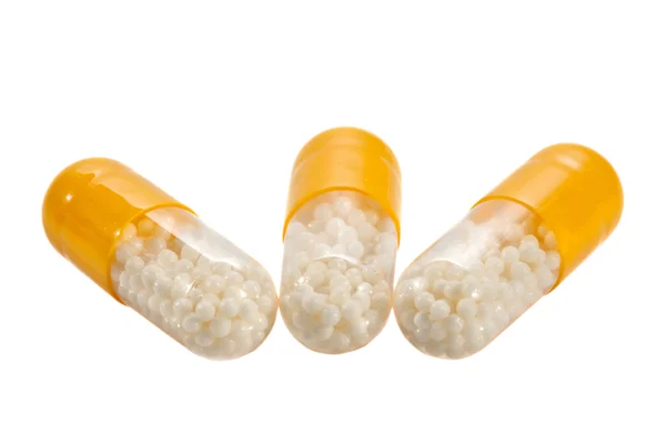 Comprimidos conjunto isolado no fundo branco — Fotografia de Stock