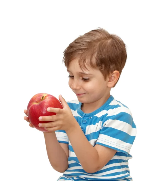Retrato de un niño con una manzana en la mano — Foto de Stock