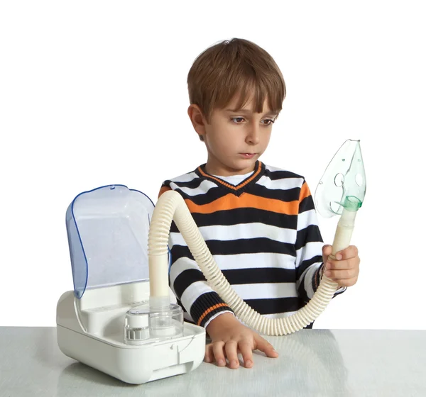 stock image Little boy makes inhalation with nebuliser