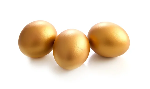 Golden egg on a white background — Stock Photo, Image