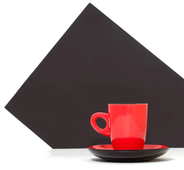 Tasse à café rouge sur fond noir — Photo