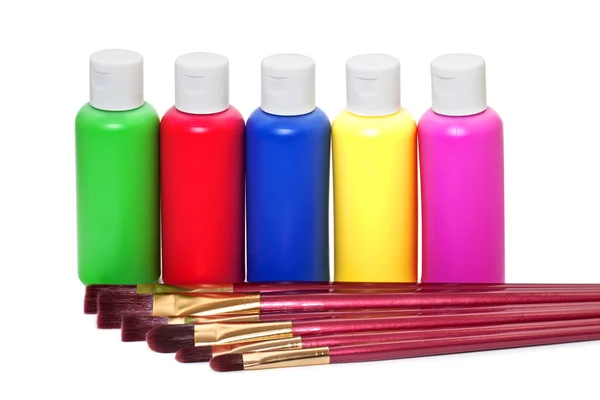 Brushes and acrylic paints on a white background — Stock Photo, Image