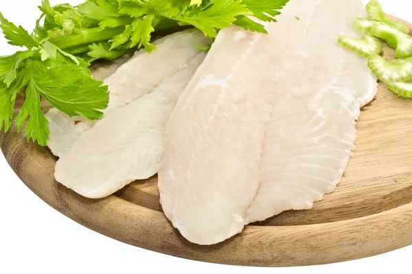 Fresh fish fillets with spices and celery — Stock Photo, Image