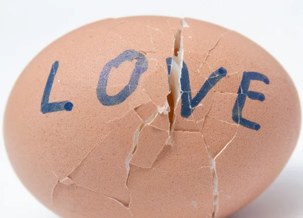 stock image Cracked egg with word love