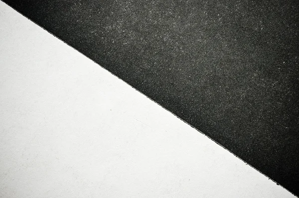 黒と白の分けられた紙 — ストック写真
