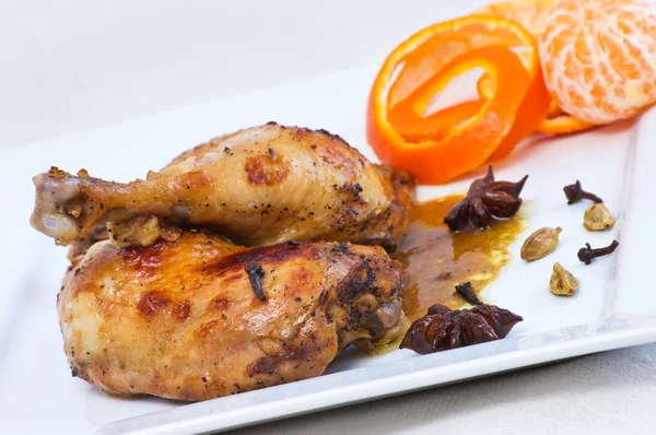 Chicken legs baked in oriental style — Stock Photo, Image