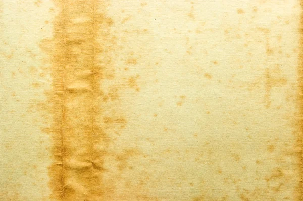 Sol tarafta leke ile eski sarı kağıt — Stok fotoğraf