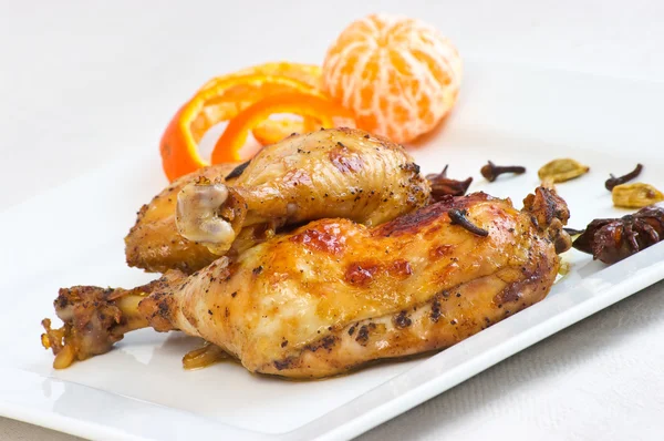Chicken legs baked in oriental style — Stock Photo, Image