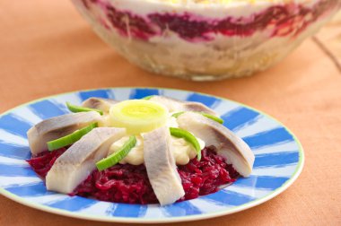 Traditional herring salad with beetroots clipart