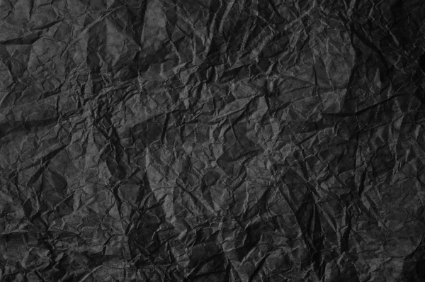 Černý zmačkaný papír — Stock fotografie