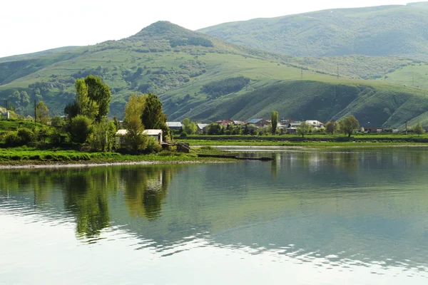 stock image Landscape with lake, forest, mountain and blue sky