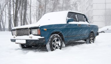 Car covered in snow clipart