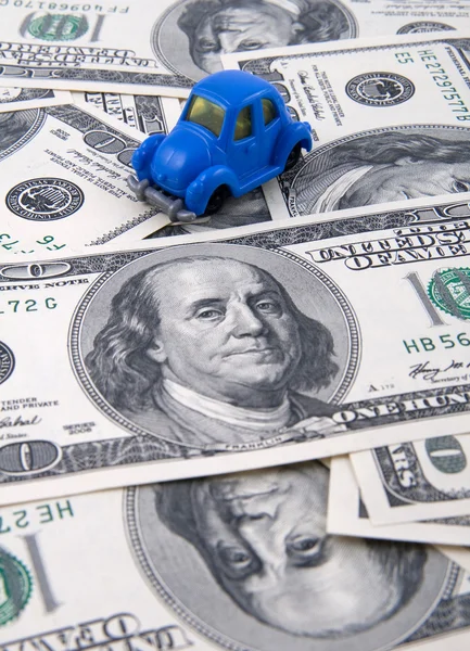 Toy car on money background — Stock Photo, Image
