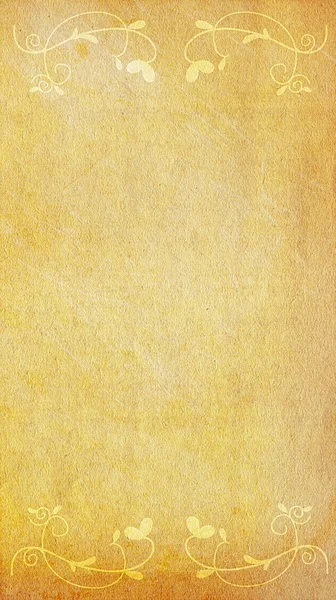 Желтая бумага с орнаментом — стоковое фото
