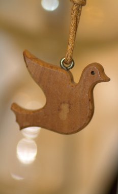 Necklace pendant dove-shaped clipart