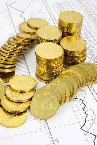 Golden coins concept on business background — Stockfoto