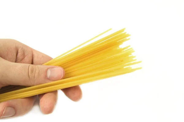 stock image Man's hand holding a spaghetti