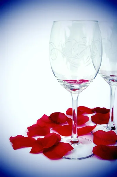 stock image Glasses and rose petals composition