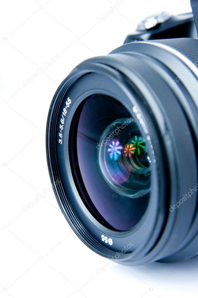 Digital photo camera, lens, closeup, isolated