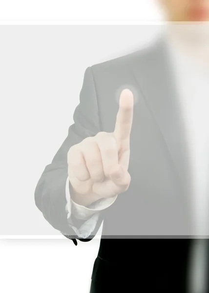 Ο άνθρωπος των επιχειρήσεων σε ένα κοστούμι που δείχνει με το δάχτυλό του — Φωτογραφία Αρχείου