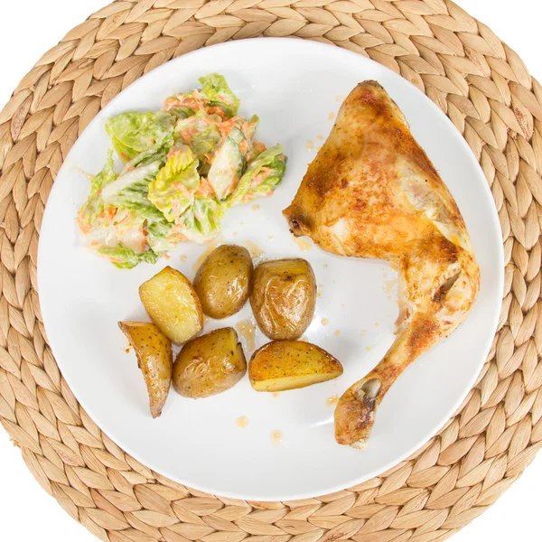 Chicken with potato wedges and salad — Stock Photo, Image