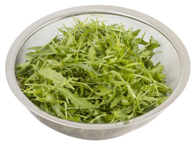 Arugula in colander