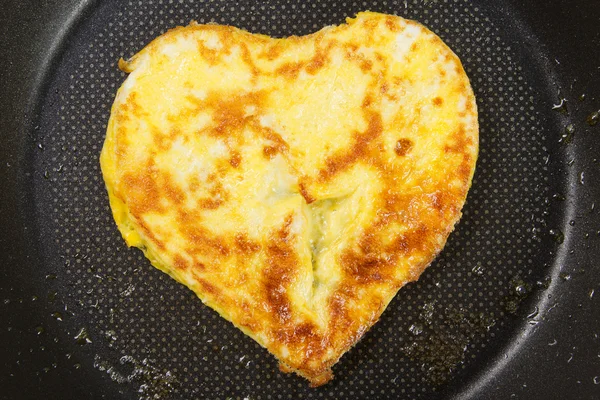 stock image Heart shaped scrambled eggs