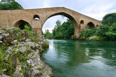 Roman bridge of Cangas de Onis, Asturias, Spain clipart