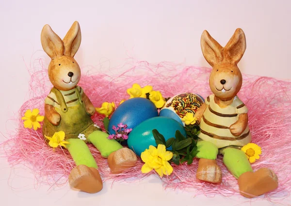 stock image Easter rabbits and dyed eggs