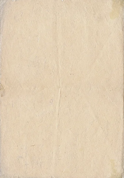 Vintage gulaktig papper, vertikala orient. — Stockfoto