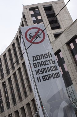 Moskova - 24 Aralık: Kızgın poster Birleşik Rusya partisi hakkında. 12