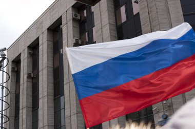 MOSCOW - DECEMBER 24: Russian flag. 120 thousands of protesters clipart