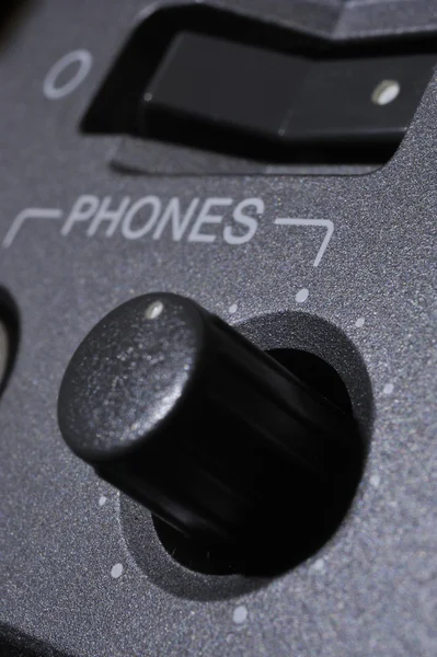 Macro shot of the "Phones" button — Stock Photo, Image