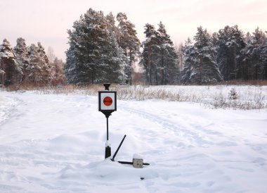 Closeup of old-style railway traffic lights. clipart