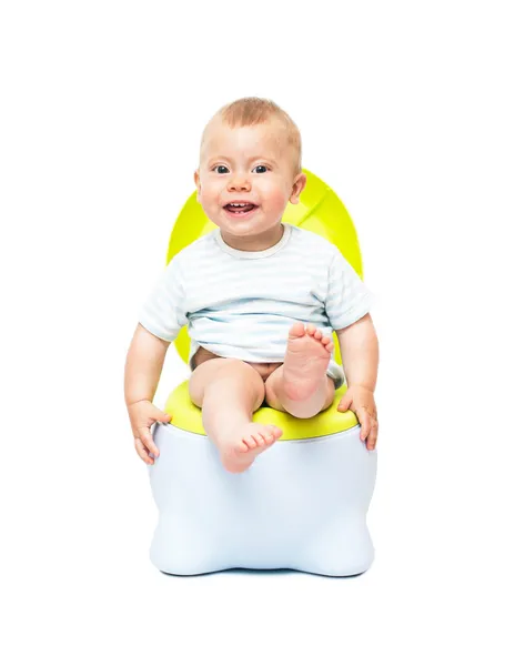 The boy sits on a chamber pot — Stock Photo, Image