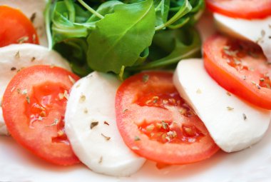 Salad with tomatoes and mozzarella clipart