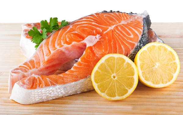 Fresh raw Salmon on a cutting board — Stock Photo, Image