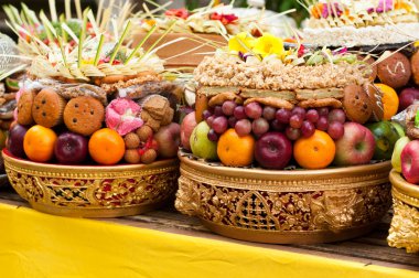 Offering in Bali Hindu temple clipart