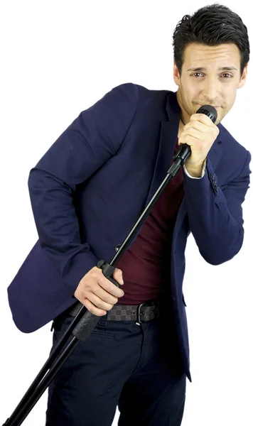 Singer with microphone smiling — Stock Photo, Image