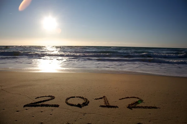 2012 水平在沙滩上写 — 图库照片
