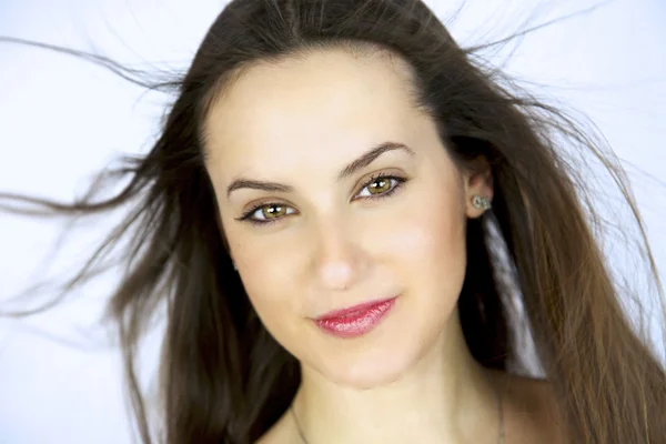 stock image Female model with flying hair