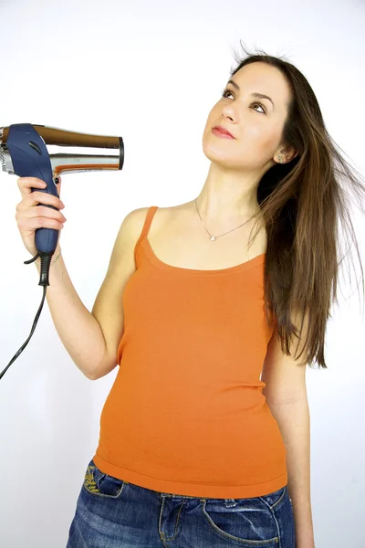 Pretty girl drying her hair — Stock Photo, Image