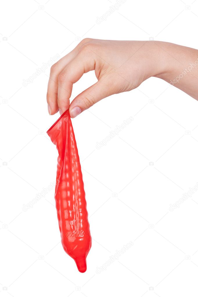 Red condom in his hand