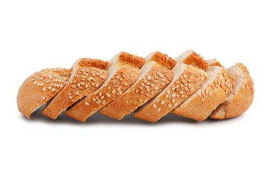 Cut into slices of French bread with sesame seeds clipart