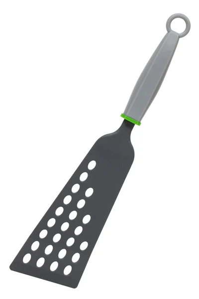 Тефлоновая лопатка для удаления пищи — стоковое фото