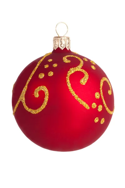 Christmas toy - a red ball with gold designs — Stock Photo, Image