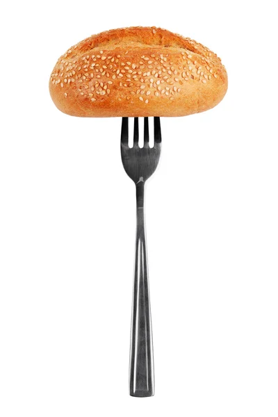 Kleine Franse roll met sesamzaad, nakolataya een vork — Stockfoto